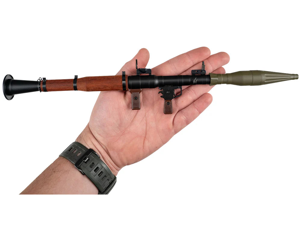 die-cast metal RPG miniature with real wood heat shield