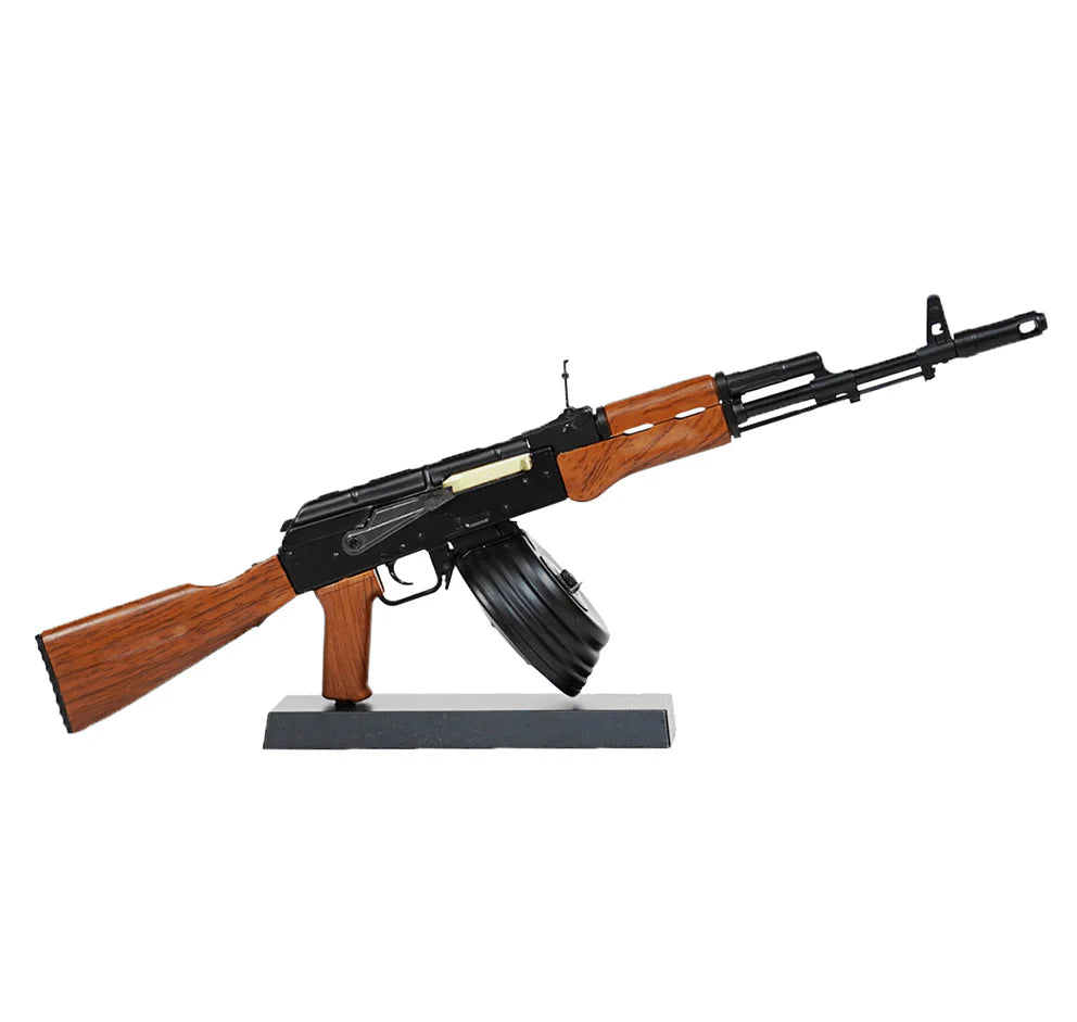 Fully assembled GoatGuns AK drum magazine on display stand