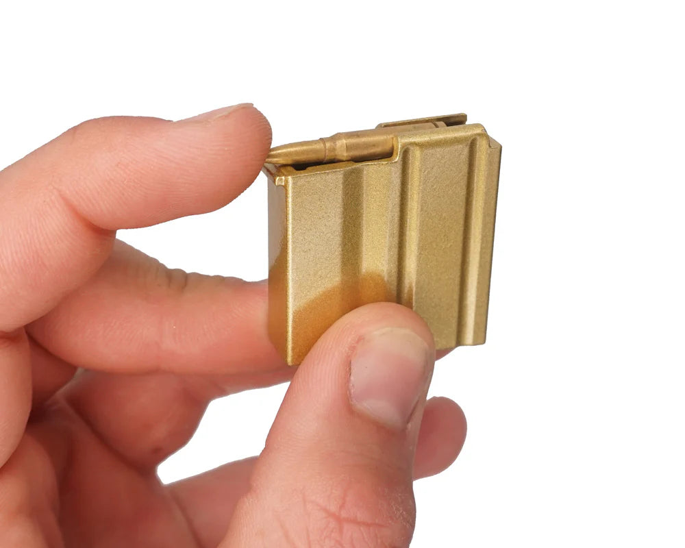 Close-up of bolt carrier and carry handle on Gold Barrett 82A1 model