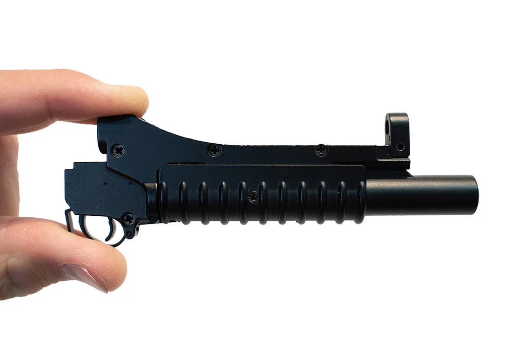 Miniature M203 grenade launcher attachment for GoatGuns AR-15 models