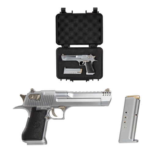 Close-up of the silver toy gun Desert Eagle model showing texture and trigger