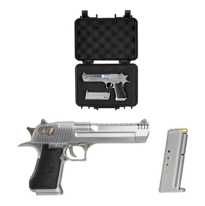 Close-up of the silver toy gun Desert Eagle model showing texture and trigger