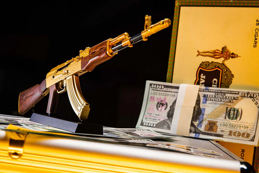 Gold AK47 miniature model rifle with functional bolt