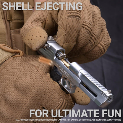 Silver Desert Eagle toy gun displayed on a wooden desk setup